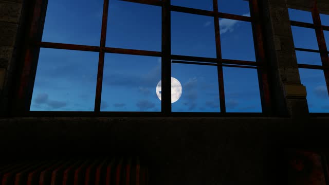 Moonlight shining through prison cell windows