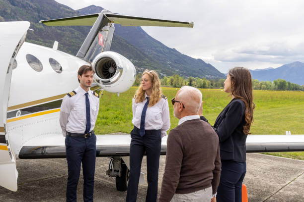 istock Business people meeting pilots before private jet flight 1487259769
