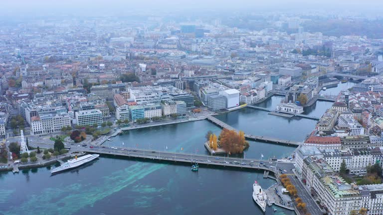 4k drone aerial view of Geneva City Switzerland with view over Geneva city center ,Aerial view of Geneva and the harbour along Lake Geneva