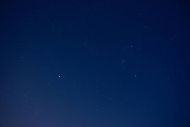 istock Orion constellation and various star clusters photographed with wide angle lens. 1487261222
