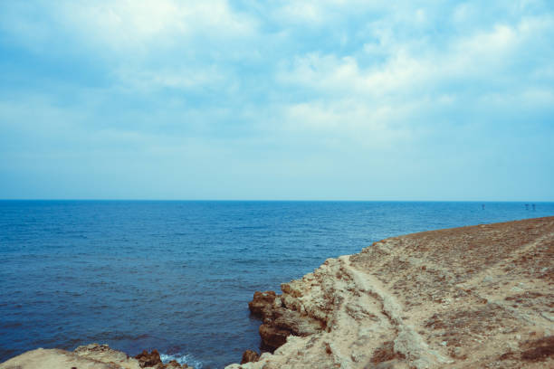 istock rocks ledges by the sea 1487261291