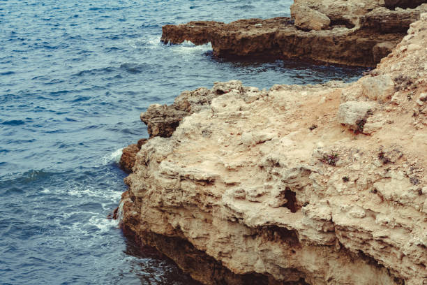 rocks ledges by the sea, cape by the sea