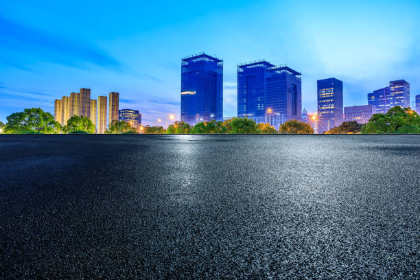 istock Asphalt road and skyline at night 1487263884