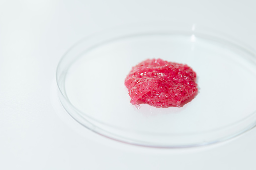 Sample of Natural Scrub with Heating Effect in Laboratory Petri Dish on white background