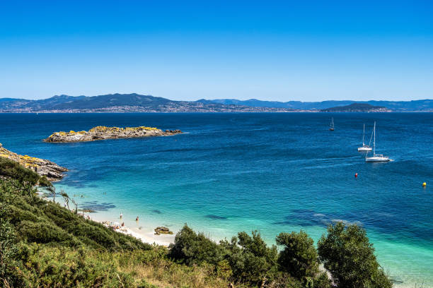 Beach Praia de Nosa Senora in Cies Islands, white sand and clear turquoise water, Galicia, Spain stock photo