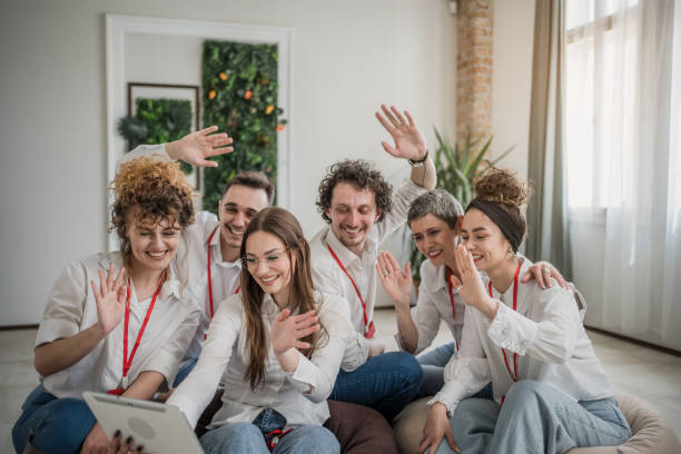 istock Online meeting with diverse group of people on digital device 1487271314