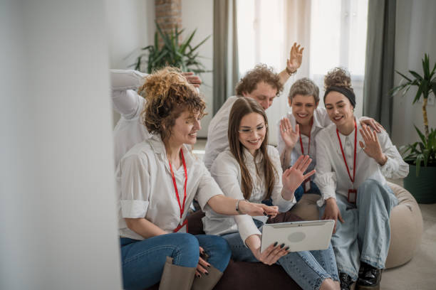 istock Online meeting with diverse group of people on digital device 1487271324