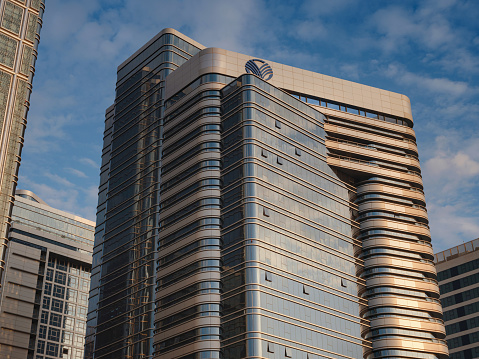 Abu Dhabi, UAE - March 19, 2023: Al Rawdah - Al Ma'arid - Abu Dhabi, skyscrapers against the background of the sunset sky, embassy district