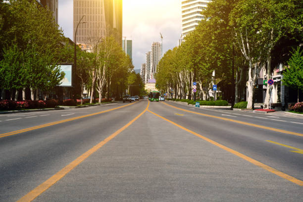 istock Empty city avenue in the summer on a day off. 1487272480