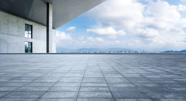 istock Empty square floor and city skyline with building background 1487272734