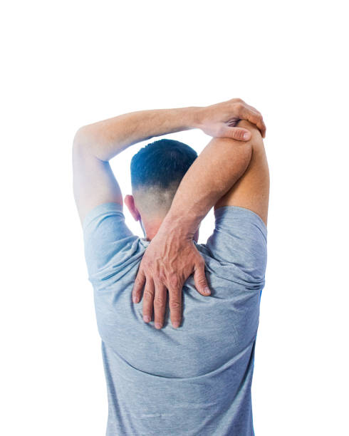 istock man doing an exercise for the arms and back, warming up before training, black and white photo from the back, male training, yoga for men 1487272830