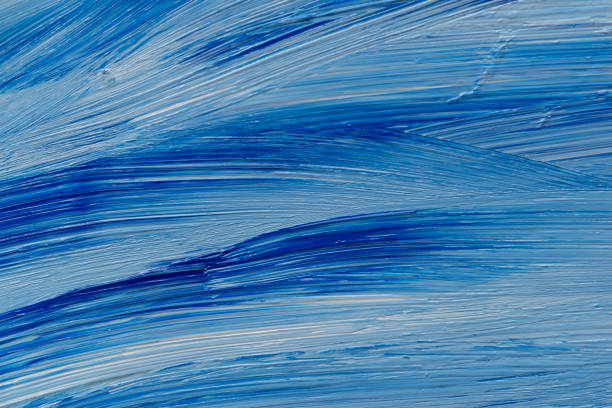 istock blue and white paint mixed together 1487274134