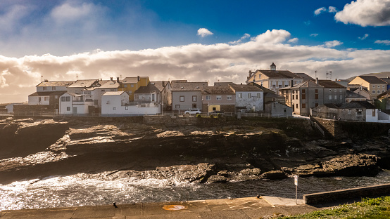 Rinlo, Galicia, Spain - April 2, 2023: Old houses in the waterfront