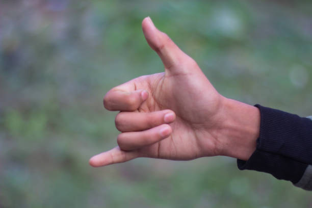 istock two finger in one hand are open and the rest are wrapped 1487278750
