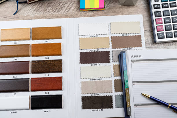 istock choice of materials wooden laminate sample with empty notepad and penci 1487280517