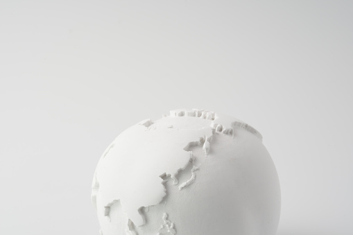 white globe on white background