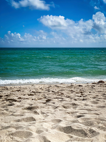 Atlantic Ocean, Miami Beach, Florida, USA against blue sky with clouds