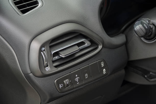 istock Air vent grill in a car. Air conditioner grid and control panel buttons. 1487281869