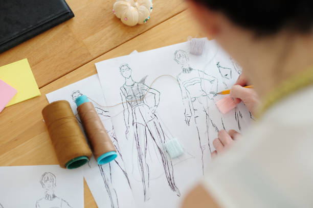 istock Designer Drawing Fashion SketcheS 1487281947
