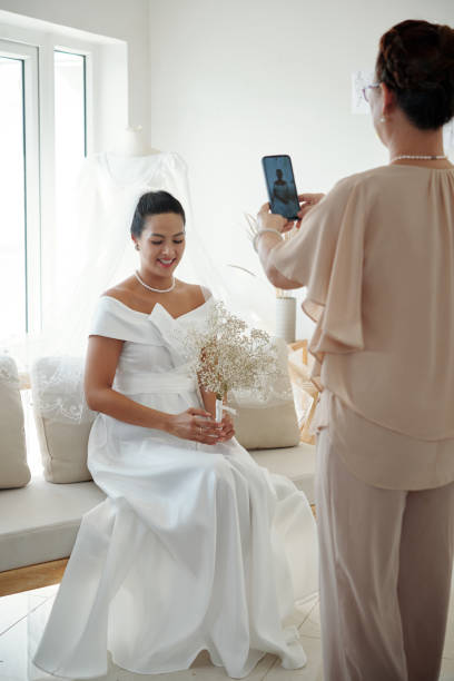 istock Elegant Bride in Sewing Atelier 1487282066