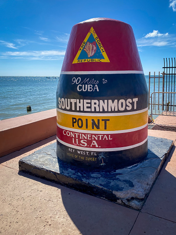 Concrete buoy at Southernmost Point of the continental USA landmark on a beautiful day, Key West, Florida