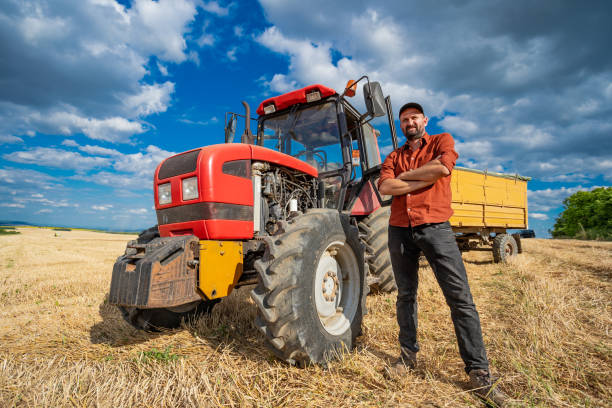 istock Farmer standing with arms crossed 1487285378