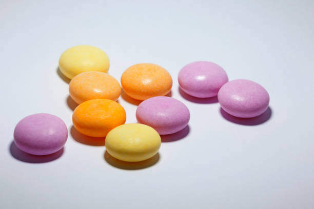 chewy candy with fruit flavor on white background
