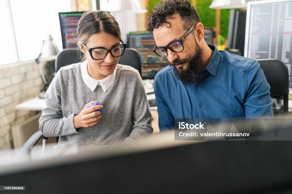 Software Programmers Analyzing Html Code And Database Brainstorming ...