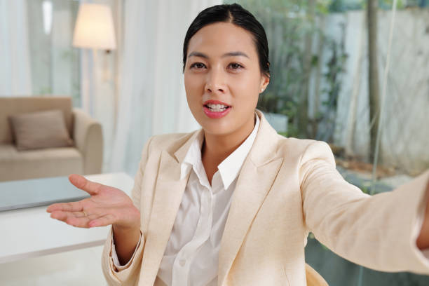istock Businesswoman Video Calling Coworker 1487289701
