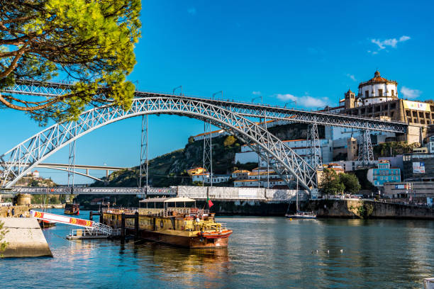 View of Porto Old Town at sunny day, Portugal View of Porto Old Town at sunny day, Portugal rabelo boat stock pictures, royalty-free photos & images