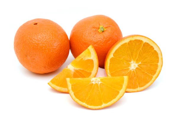 istock Nice fresh orange isolated in wooden bowl on a white background 1487300566