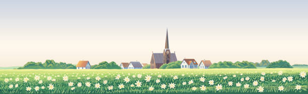 сельский пейзаж с деревней и цветущим лугом на переднем плане. - village church stock illustrations