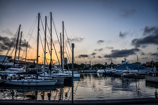 Yachts Moored to Jetties in Victoria Inner Harbour at Sunset. Vancouver Island, BC, Canada.