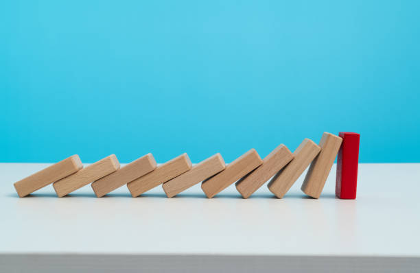 istock The red domino stands out 1487303910