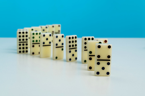 Domino pieces standing in a row