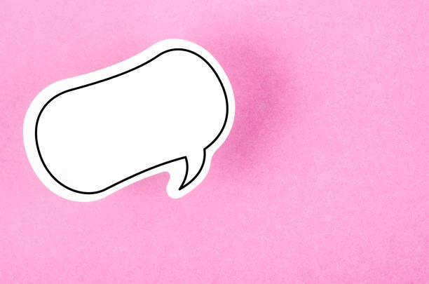 The Speech bubble with copy space communication talking speaking concepts on pink color background. stock photo