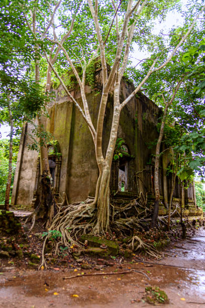 istock Wat Somdet Old (Thai Temple) It was abandoned is located at the jungle on a small hill in Sanghklaburi, Kanchanaburi, Thailand. 1487304614