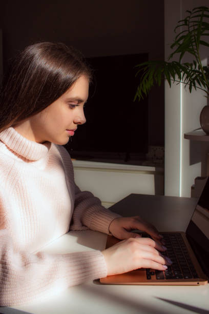 istock Teenage girl does homework. Homework study. Online education. 1487306162