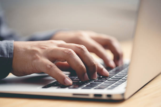 istock Connect online business using laptop. or Sitting work at cafe. 1487308256