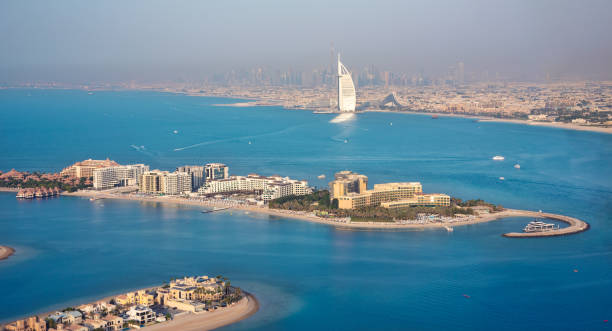 istock Dubai city panoramic view from water and Palm Jumeirah 1487309852