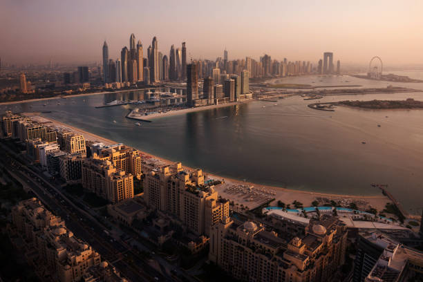 istock Dubai skyline on sunset, modern city with skyscrapers 1487310060
