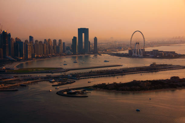 istock Dubai skyline on sunset, modern city with skyscrapers 1487310158