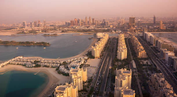 istock Dubai skyline on sunset, modern city with skyscrapers 1487310175
