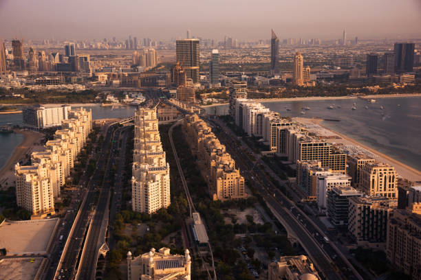 istock Dubai skyline on sunset, modern city with skyscrapers 1487310194
