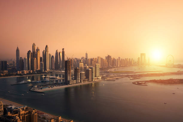 istock Dubai skyline on sunset, modern city with skyscrapers 1487310890