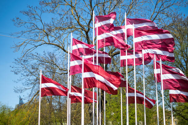 istock Latvian National Flags in The Wind 1487315243