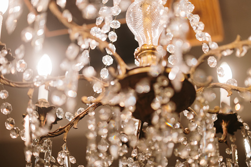 Chandelier golden color with gold crystal