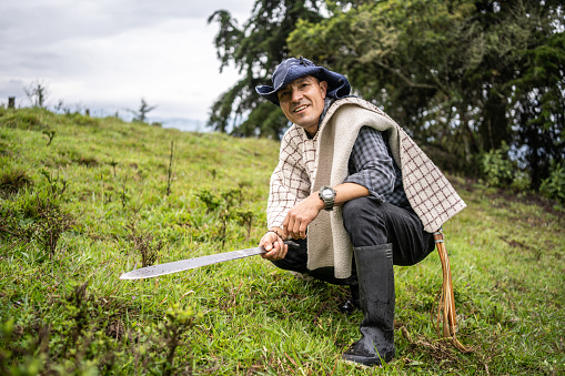 Portrait of a mature farmer working on the agricultural field