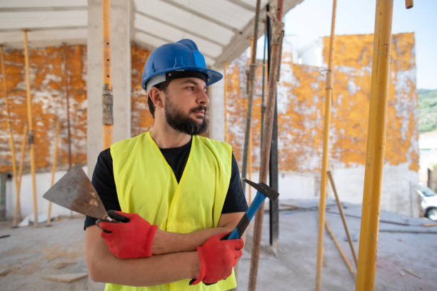 istock House construction, construction worker arms crossed portrait 1487318018