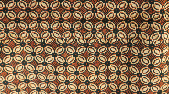 A traditional Indonesian fabric, namely batik cloth which has unique and different patterns and image motifs for each region. Cultural theme photos, typical of Asia.
